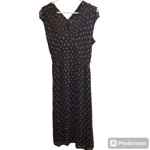 April Cornell black floral dress. Ties at back to adjust waist  EUC slip inside